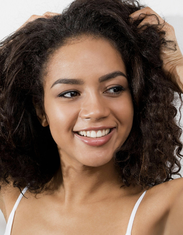 Signature Dental Aesthetics organic woman smiling