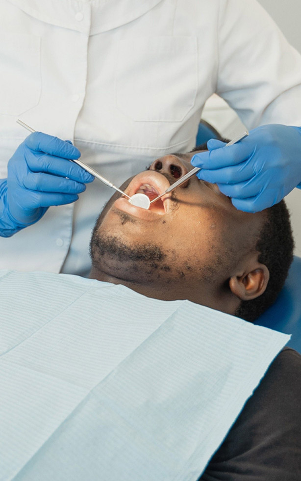 Signature Dental Aesthetics tooth inspection