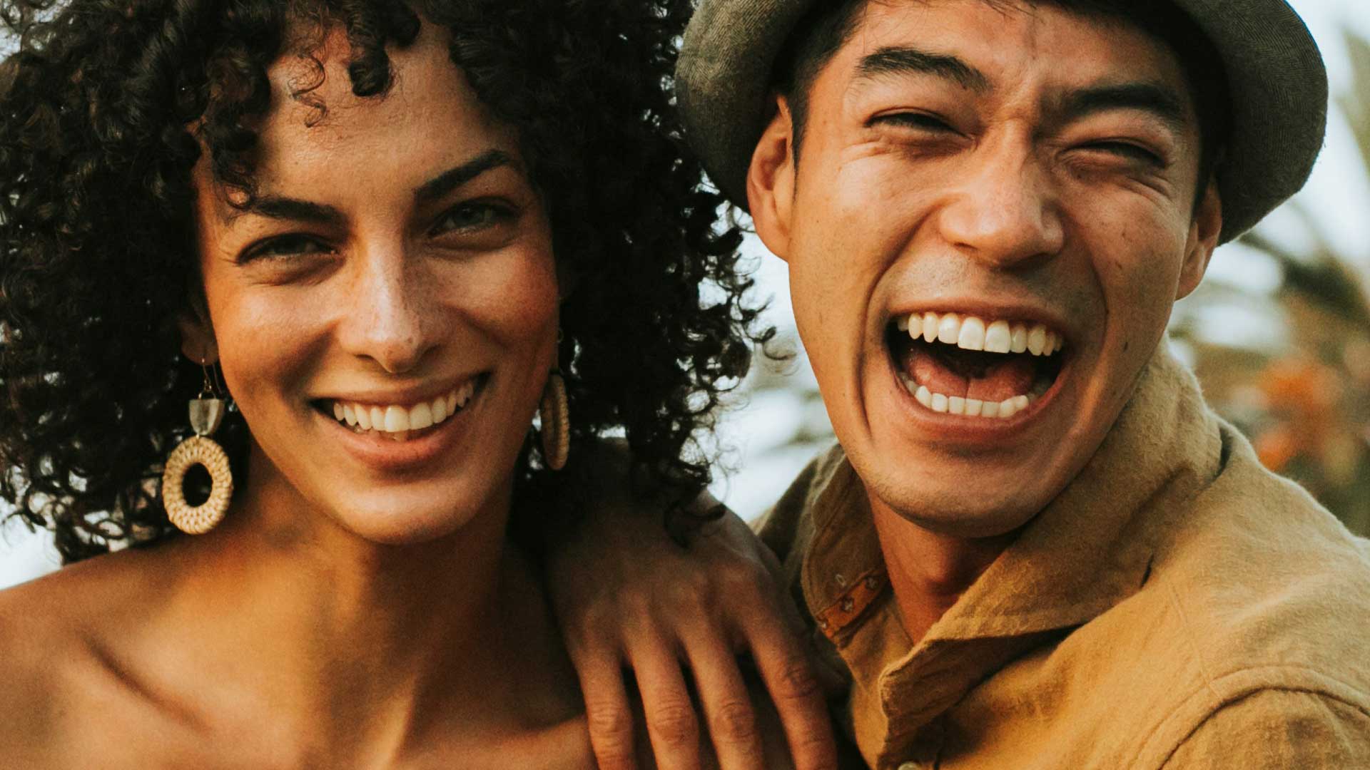 Signature Dental Aesthetics male and woman smiling