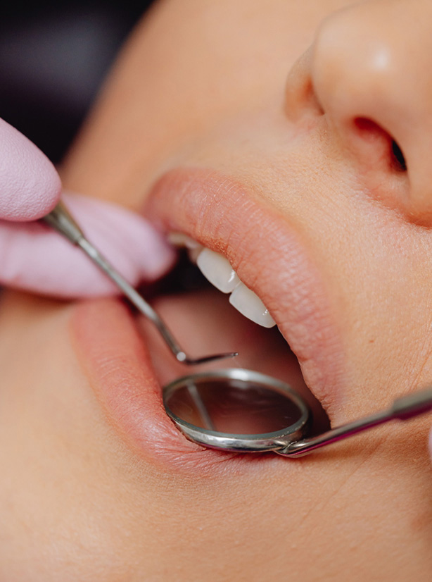 Signature Dental Aesthetics tooth inspection